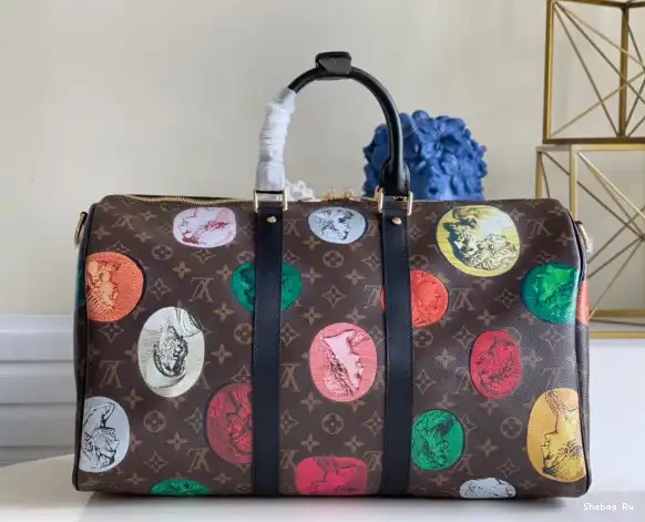 45 VUITTON BANDOULIÈRE KEEPALL LOUIS 0522